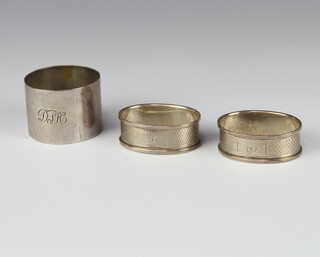 A silver napkin ring Birmingham 1920, 2 others, 55 grams