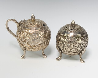 Two Indian repousse silver condiments decorated with flowers 92 grams 