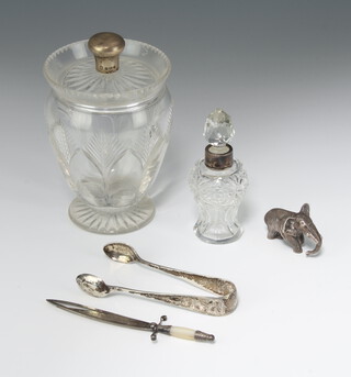 A Victorian silver and other mother of pearl sword bookmark Birmingham 1893, a mounted jar, scent, pair of nips and white metal elephant 