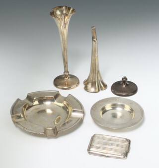 A circular silver ashtray Birmingham 1900, an Armada dish, match holder and 2 spill vases by William Cummings & Sons Ltd. 188 grams