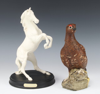 A Beswick white matt figure - Spirit of the Wild no.H183 by Warren Platt 30.5cm, on a circular base together with a Royal Doulton Famous Grouse liqueur bottle and stopper 