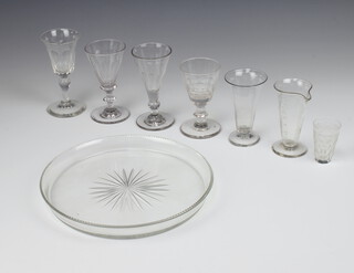 A Georgian style cut glass wine, 10cm , four others, a tot, a measure and a glass tray