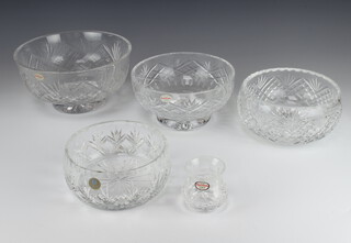 A deep cut glass fruit bowl 24cm, a ditto 20cm, another 18cm, another 16.5cm and a vase 6cm