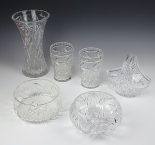 A cut glass basket 18cm, a flared neck vase 30cm, a pedestal bowl 18cm, a pair of vases 17cm and a fruit bowl 19cm