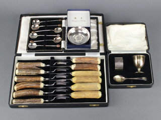 A set of 6 pairs of Fortnum & Mason stag horn steak knives and forks, 2 cased sets and a plated dish 