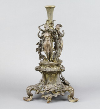 A 19th Century bronze three section epergne stand, possibly made up, supported by figures depicting music 40cm h x 23cm diam