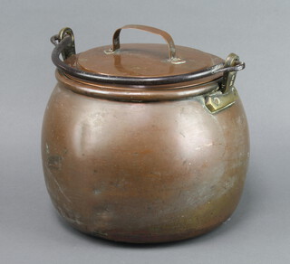 A circular copper, brass and steel cooking pot marked W2 24cm h x 26cm diam