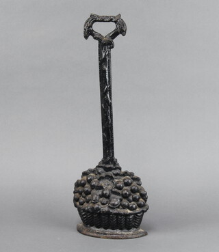 A Victorian cast iron doorstop in the form of a basket of fruit 43cm h x 15cm w x 6cm d 