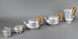 A Piquot ware 5 piece tea service comprising two tea pots, a lidded sugar bowl, sugar bowl and hot water jug