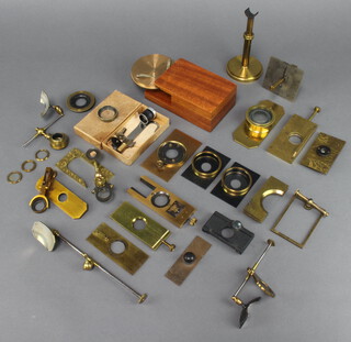 A quantity of various gilt metal microscope component parts