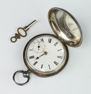 A silver hunter pocket watch in a 45mm case, London 1929
