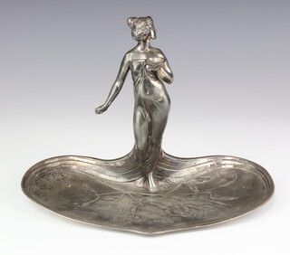 A WMF pewter dish supported by a figure of a standing lady, back mark BWMF 1/0OX 32cm x 27cm 15cm 