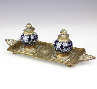 A Victorian pierced gilt metal and porcelain twin bottle inkwell 9cm x 35cm x 11cm 