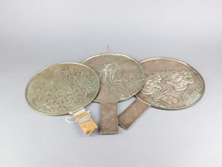 Three 19th Century Japanese polished bronze hand mirrors 23cm, 24cm, 24cm  
