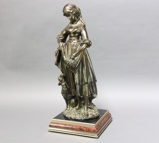 A bronzed figure of a standing shepherdess, raised on a square ebonised base 60cm h x 26cm w x 25cm d 