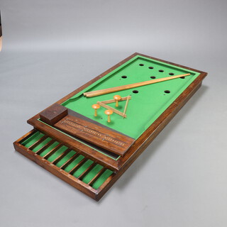 A bar billiard table 15cm h x 148cm x 70cm, complete with 2 cues, score board, 3 mushroom and various chalk (no balls) 