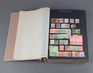 An album of used GB stamps 1840-1981 including a penny black, penny reds etc together with a stock book of GB Elizabeth II used stamps 