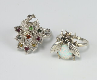 A silver and paste peacock dress ring, a ditto bug ring 11 grams, size N 1/2 and P 