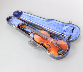 A Czechoslovakian facsimile Stradivarius violin, labelled Antonius Stradivarius Cremonensis Faceab Anno 1713 with 14" back, contained in a plastic case 