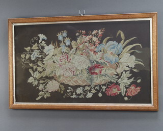A Victorian silk work embroidery still life of a basket of flowers 38cm x 62cm