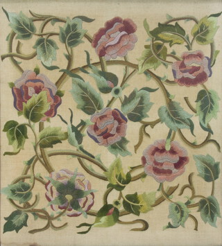 A Victorian woolwork embroidery of scrolling flowers and leaves 60cm x 52cm 