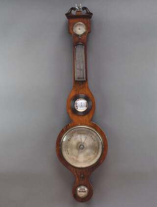 A 19th Century mercury wheel barometer and thermometer contained in a rosewood case with shaped pediment, damp/dry indicator, mirror and spirit level, marked Warranted Correct 95cm h x 26cm 