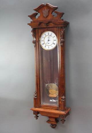 A regulator style timepiece with 16cm enamelled dial, Roman numerals and subsidiary second hand, contained in an oak case complete with pendulum, weight and key 116cm h x 36cm w x 16cm d 