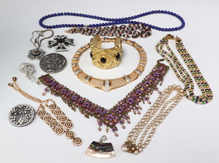 A quantity of vintage costume jewellery including a Cross ballpoint pen