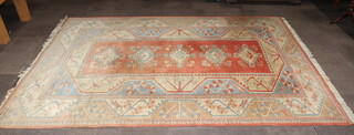 A Caucasian style carpet, the central panel with 5 diamonds 388cm x 268cm 