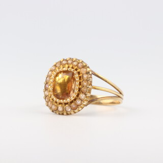 A yellow metal citrine and seed pearl ring, size N, 3.7 gms