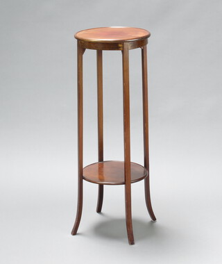 An Edwardian circular mahogany 2 tier jardiniere, raised on outswept supports 96cm h x 35cm diam. 