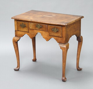 A Queen Anne style walnut side table fitted 3 drawers, raised on cabriole supports 69cm h x 76cm w x 48cm d  