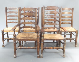 A 20th Century harlequin set of 6 elm ladder back dining chairs with woven rush seats, raised on turned supports (2 carvers, 106cm h x 57cm w x 50cm d seats 31cm x 30cm and 4 standard 99cm h x 48cm w x 40cm d seats 29cm x 30cm)  