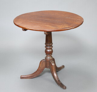 An 18th/19th Century oak snap top tea table raised on column and tripod base 70cm h x 75cm diam. 