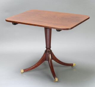 A Regency rectangular snap top breakfast table raised on a turned column and tripod base ending in brass caps and casters 73cm h x 92cm w x 62cm d 