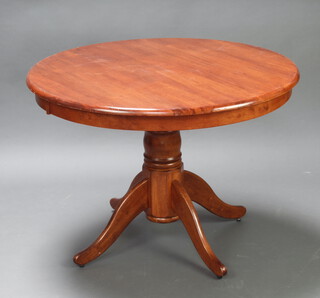 A circular mahogany pedestal table raised on column and tripod base 77cm h x 105cm diam. (contact marks)  