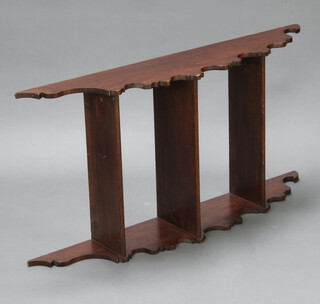 An Edwardian shaped oak 3 tier hanging wall shelf 115cm h x 57cm w x 54cm d 