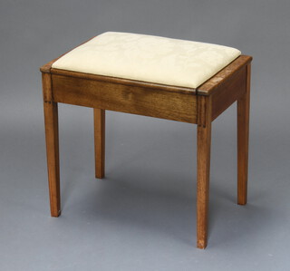 A beech framed box seat piano stool with hinged lid 50cm x 53cm x 34cm (some water marks)