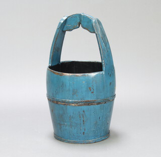 A blue painted Eastern style coopered well 68cm x 55cm diam.  