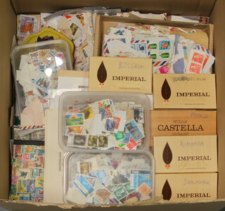 A box of various loose mint and used GB and World stamps, some on paper  