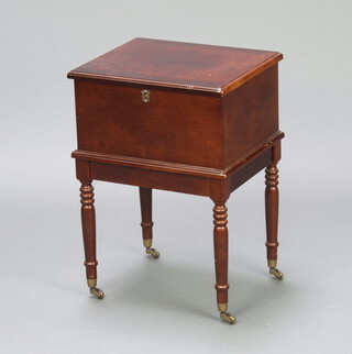 A Victorian style rectangular crossbanded mahogany sewing box with hinged lid, raised on turned supports 52cm h x 36cm w x 30cm d (contact marks)