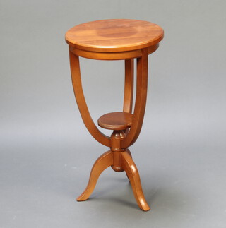 A French Georgian style circular 2 tier occasional table raised on pillar and tripod base 71cm x 38cm diam. (ring mark to top and contact marks in places) 