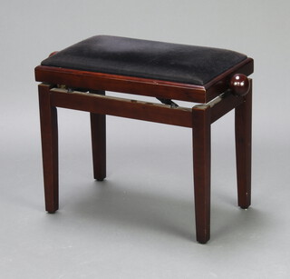 A rectangular mahogany adjustable piano stool raised on square tapered supports 47cm h x 66cm w x 32cm d  