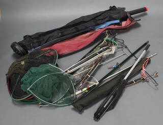 2 fishing rod tubes, a carrying case, various rod rests, keep nets and other fishing nets 