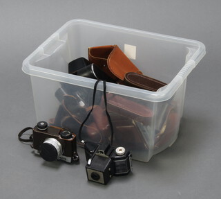 A Zenith E camera, 2 GB-Kershaw 630 folding cameras and 7 other 1950/60's cameras contained in a plastic box