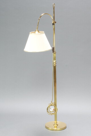 A Victorian style gilt metal adjustable standard lamp with fluted column 143cm h (some dents to base) 
