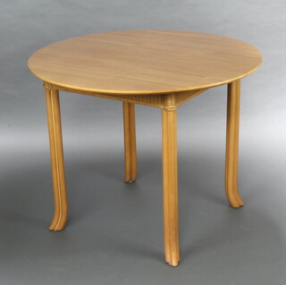 A circular beech finished Lloyd Loom occasional table 78cm h x 100cm diam. (ring and contact marks to the top) 