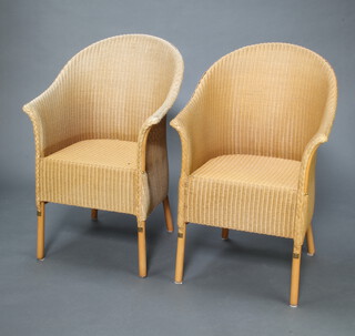 A pair of Lloyd Loom tub back chairs 89cm h x 60cm w x 50cm d (seat 32cm x 30cm) (some sun fading)  