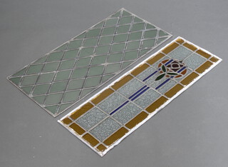 A rectangular lead and stained glass panel 93cm x 41cm together with 1 other lead and stained glass panel 31cm h x 95cm 