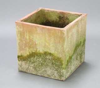 A well weathered square terracotta planter 49cm h x 49cm 